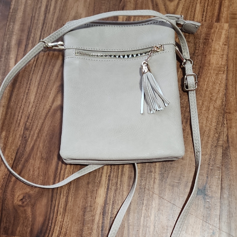 Chic Beige Crossbody Bag with Tassel